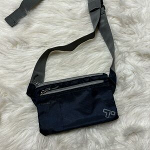 Travelon Small navy fanny pack with lots of pockets and adjustable strap